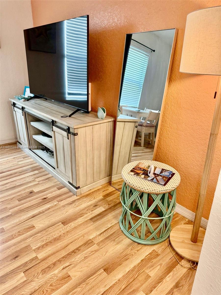 7326 Collins Avenue, Unit 105 Miami Beach, FL 33141 - Photo 7 of 13 a view of a workspace with furniture