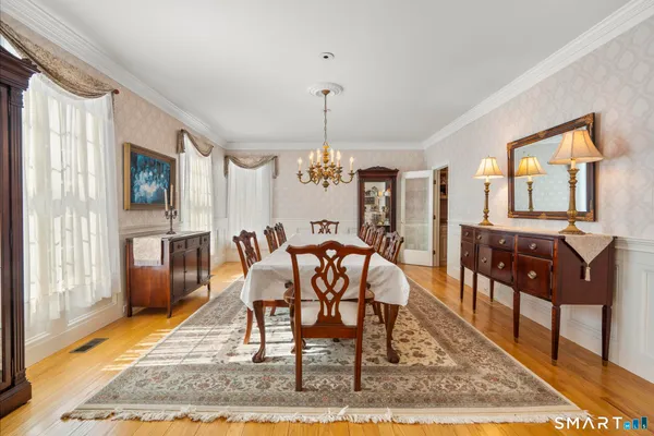 a view of a dining room with furniture