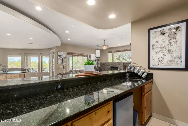a kitchen with granite countertop lots of counter top space