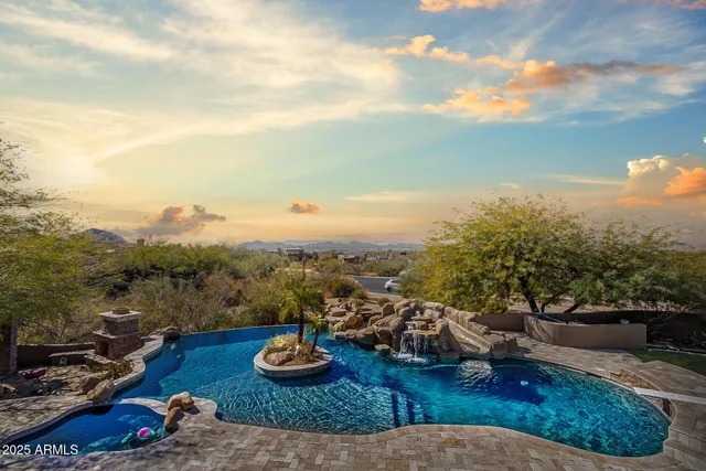 a view of a house with a yard porch and sitting area