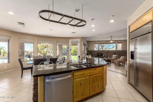 a kitchen with counter top space cabinets and stainless steel appliances