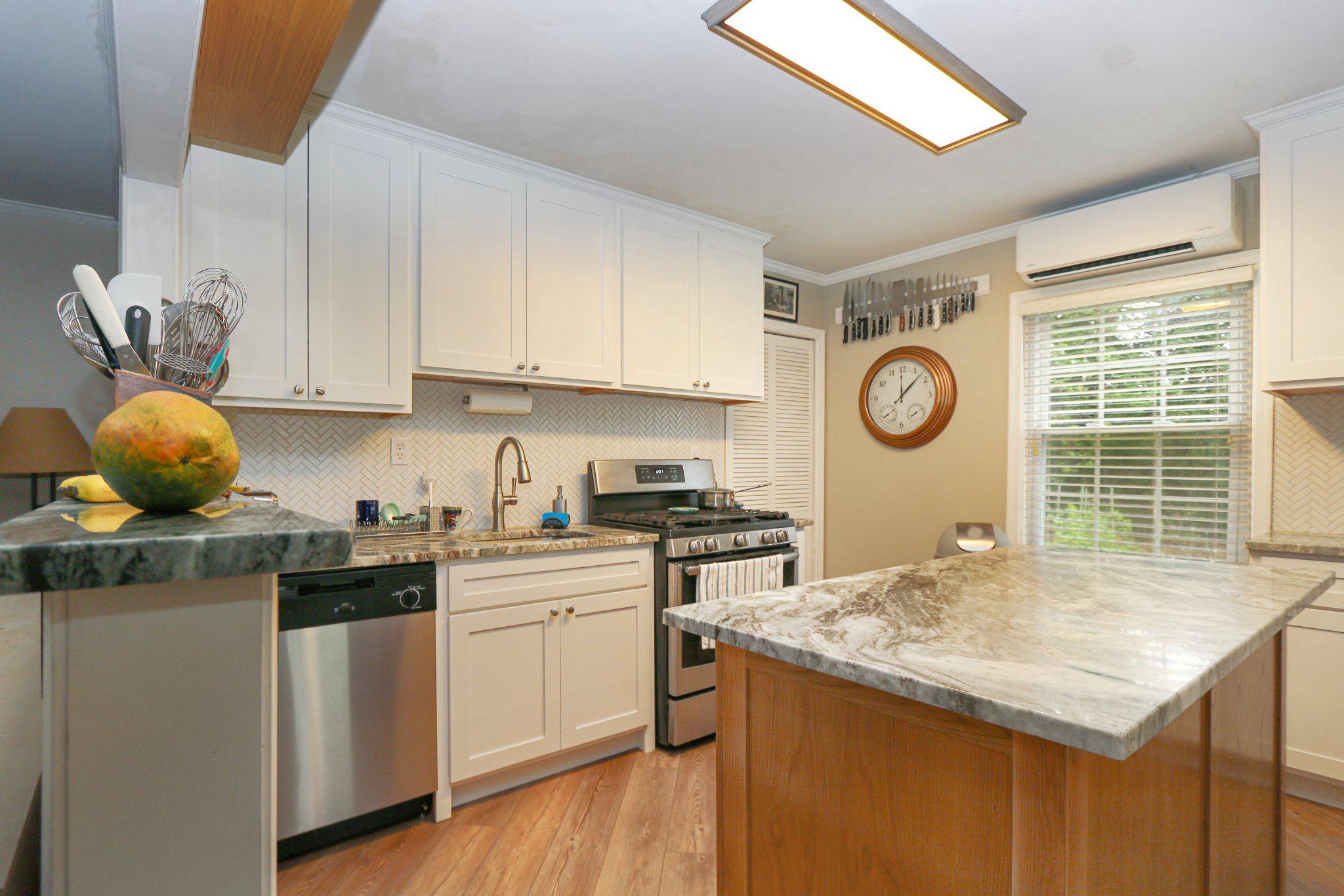 13431 Solitude Trail Machipongo, VA 23405 - Photo 14 of 32 Charming kitchen with modern touches.