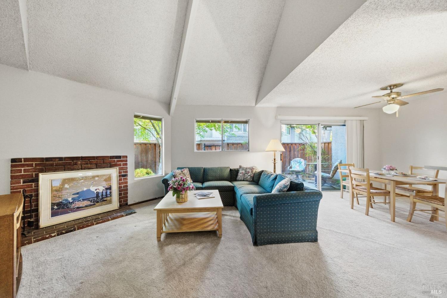 514 Racquet Club Circle Rohnert Park, CA 94928 - Photo 2 of 39 a living room with furniture and a fireplace