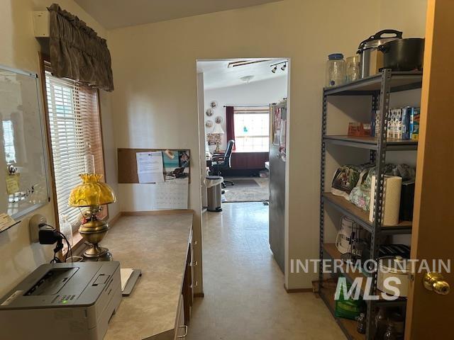 656 Liberty Lane Emmett, ID 83617 - Photo 23 of 31 Hallway featuring an office area and lofted ceiling