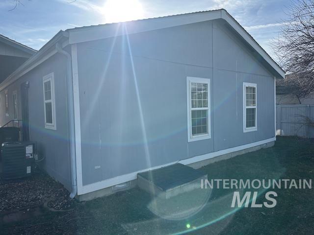 656 Liberty Lane Emmett, ID 83617 - Photo 5 of 31 View of property exterior featuring a central AC unit