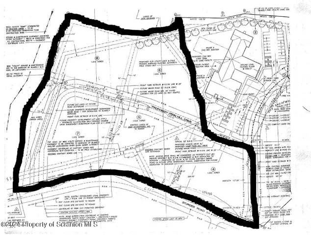 a black and white photo of a book