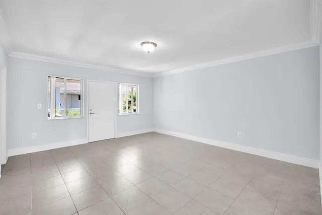 an empty room with windows