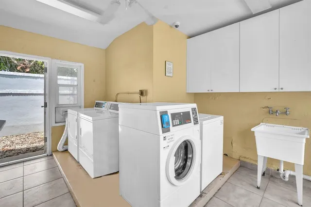 a utility room with dryer and washer