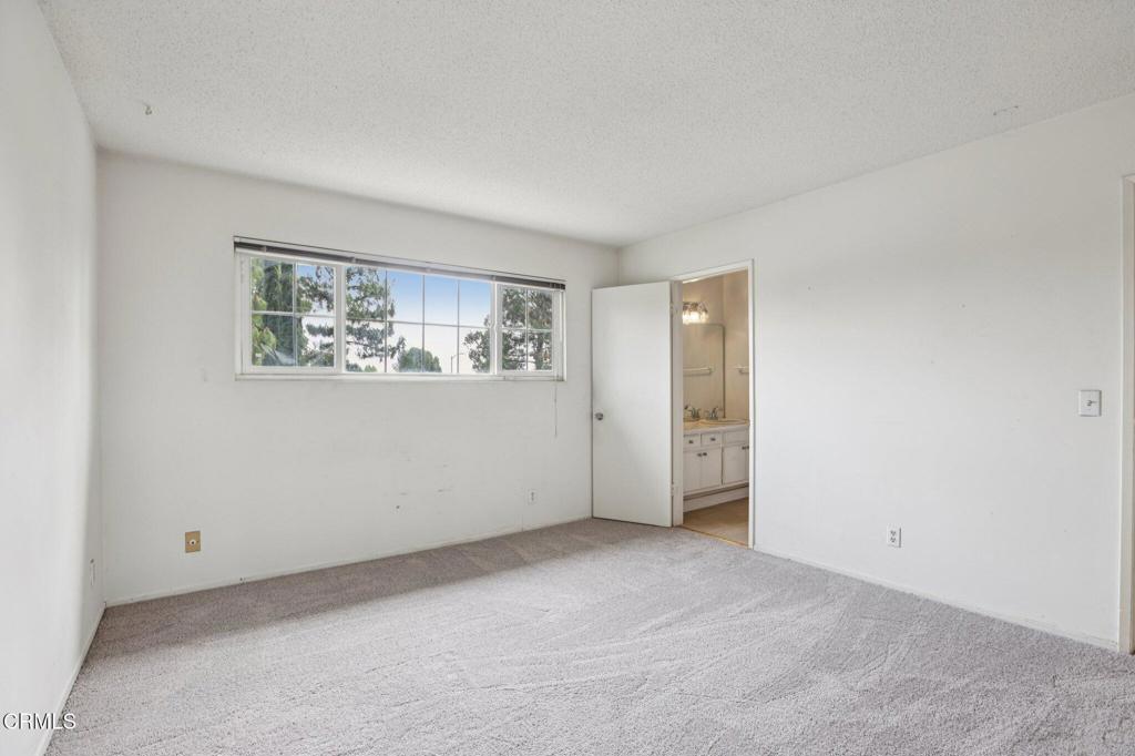 10856 Topeka Drive Porter Ranch, CA 91326 - Photo 21 of 40 a view of an empty room with a window