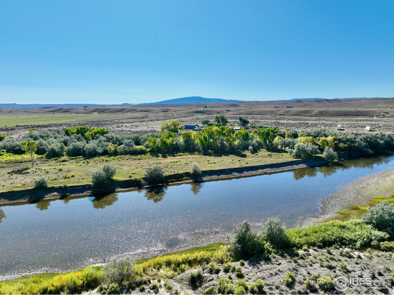 55999 Highway 318 Maybell, CO 81640 - Photo 2 of 50 a view of lake with mountain