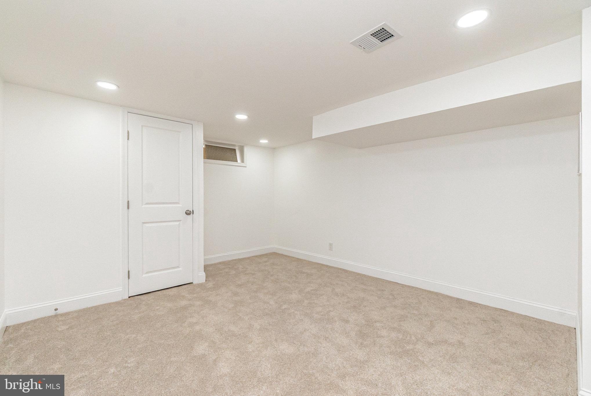 727 North Collington Avenue Baltimore, MD 21205 - Photo 20 of 25 an empty room with a empty space and windows