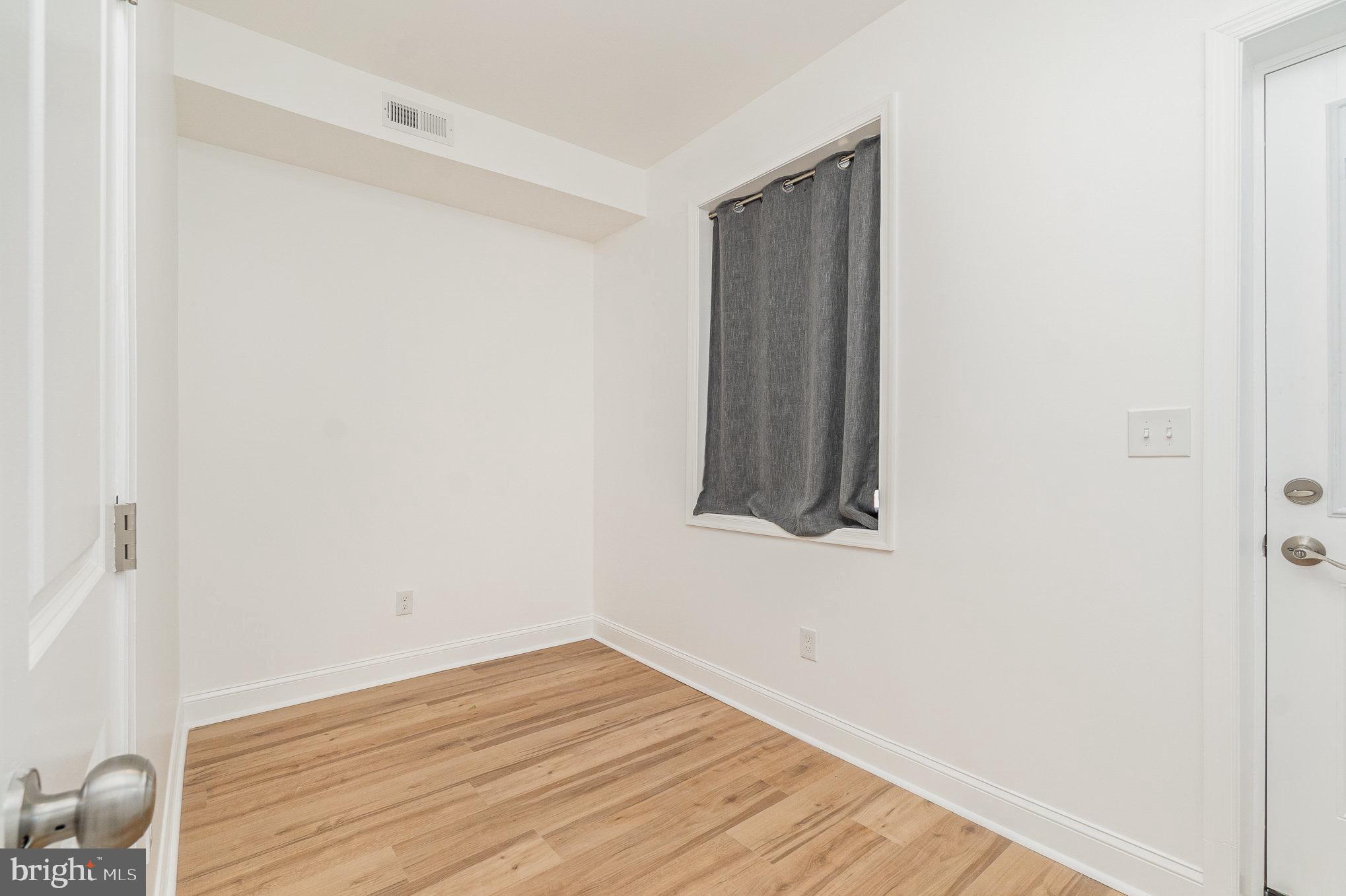 727 North Collington Avenue Baltimore, MD 21205 - Photo 7 of 25 a view of a room with wooden floor and small space