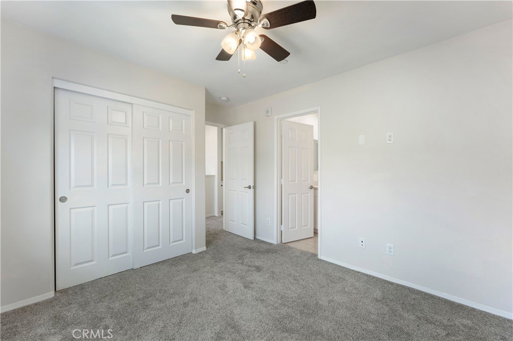 2890 Silver Medal Road, Unit 9 Chula Vista, CA 91915 - Photo 17 of 31 Secondary bedroom looking to bathroom
*Photos have been digitallyenhanced