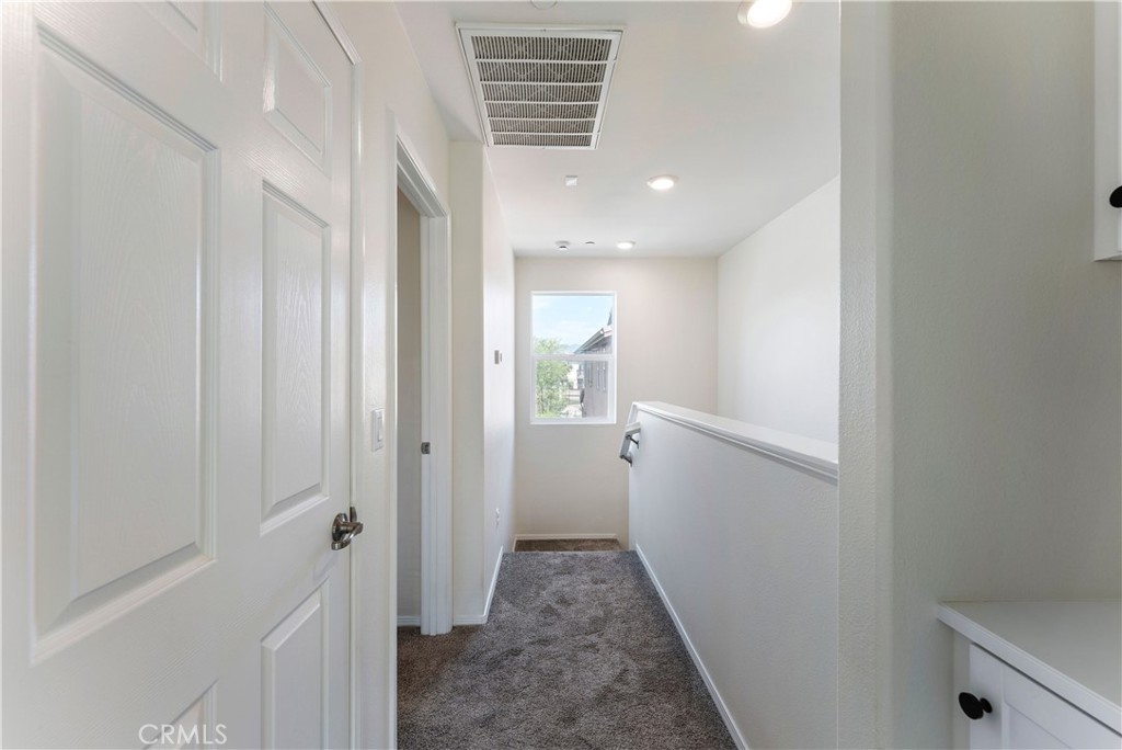 2890 Silver Medal Road, Unit 9 Chula Vista, CA 91915 - Photo 19 of 31 Hallway between bedrooms
*Photos have been digitallyenhanced