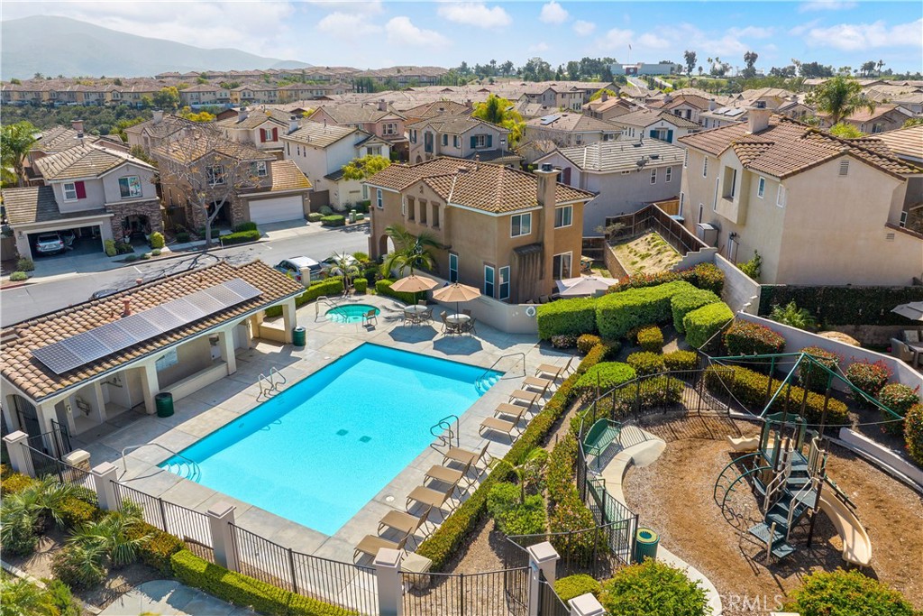 2890 Silver Medal Road, Unit 9 Chula Vista, CA 91915 - Photo 30 of 31 Community pool and clubhouse
*Photos have been digitallyenhanced