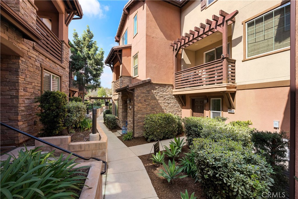 2890 Silver Medal Road, Unit 9 Chula Vista, CA 91915 - Photo 3 of 31 Walkway to Front Entrance
*Photos have been digitallyenhanced