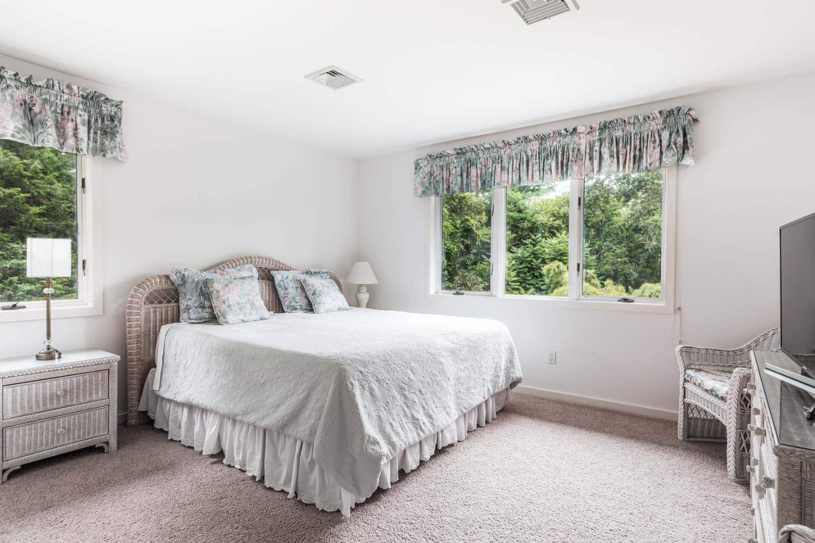 15 Atterbury Road Southampton, NY 11968 - Photo 16 of 20 a bedroom with a bed and a window