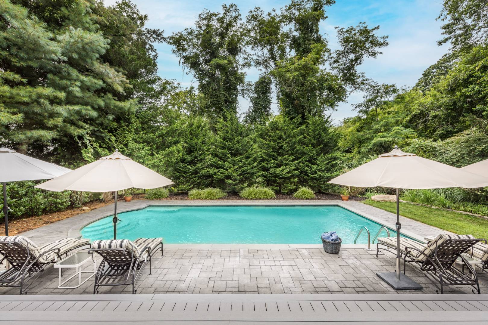 15 Atterbury Road Southampton, NY 11968 - Photo 3 of 20 a view of a backyard with a garden and patio