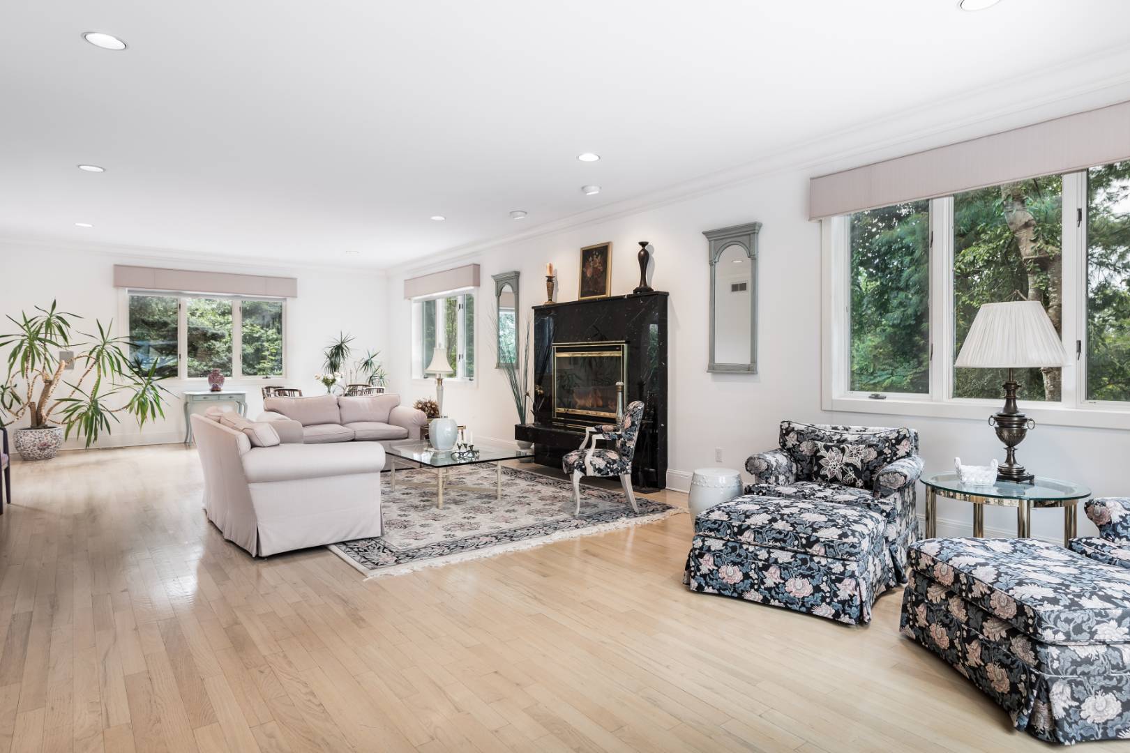 15 Atterbury Road Southampton, NY 11968 - Photo 9 of 20 a living room with furniture and a flat screen tv