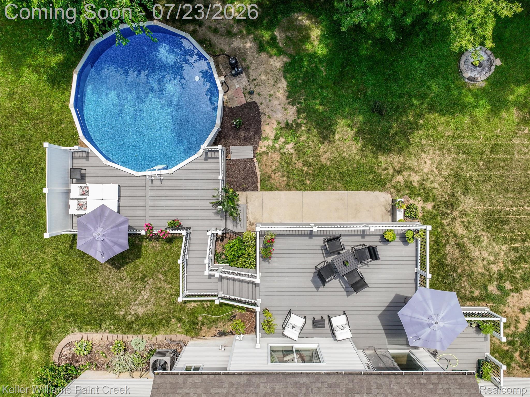 2611 Quail Run Street Rochester, MI 48306 - Photo 5 of 48 Expansive backyard featuring a multi-level composite deck with white railings