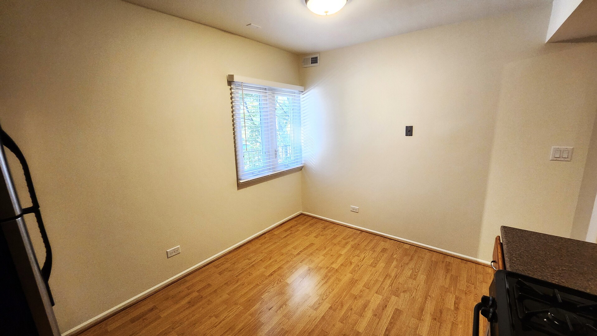 1450 Sandpebble Drive, Unit 333 Wheeling, IL 60090 - Photo 12 of 22 an empty room with windows