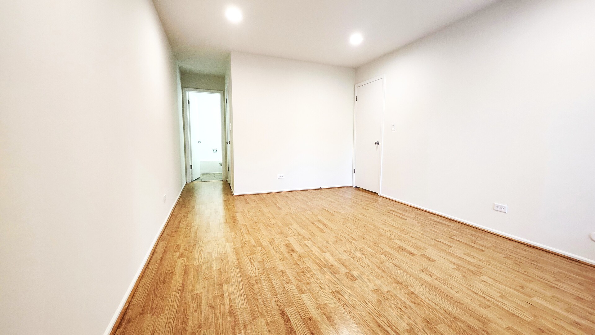 1450 Sandpebble Drive, Unit 333 Wheeling, IL 60090 - Photo 16 of 22 a view of empty room with wooden floor