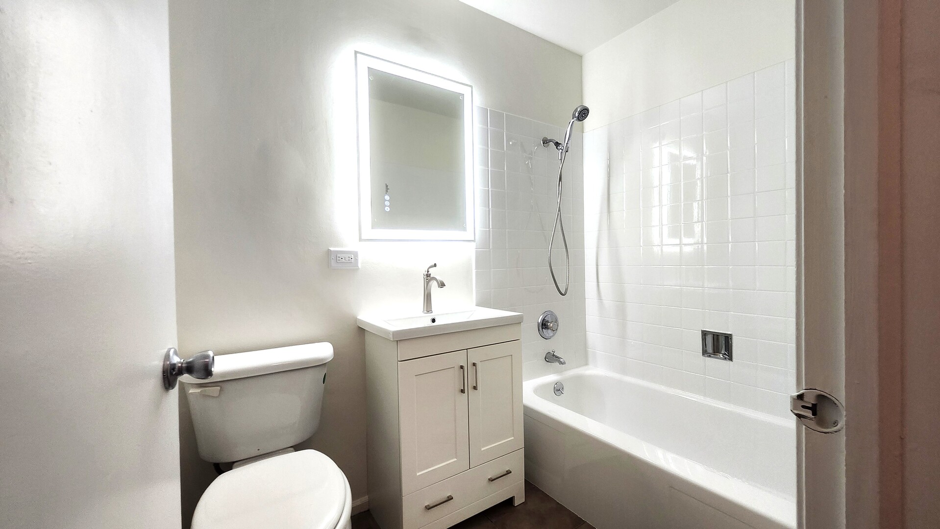 1450 Sandpebble Drive, Unit 333 Wheeling, IL 60090 - Photo 22 of 22 a bathroom with a sink toilet and shower