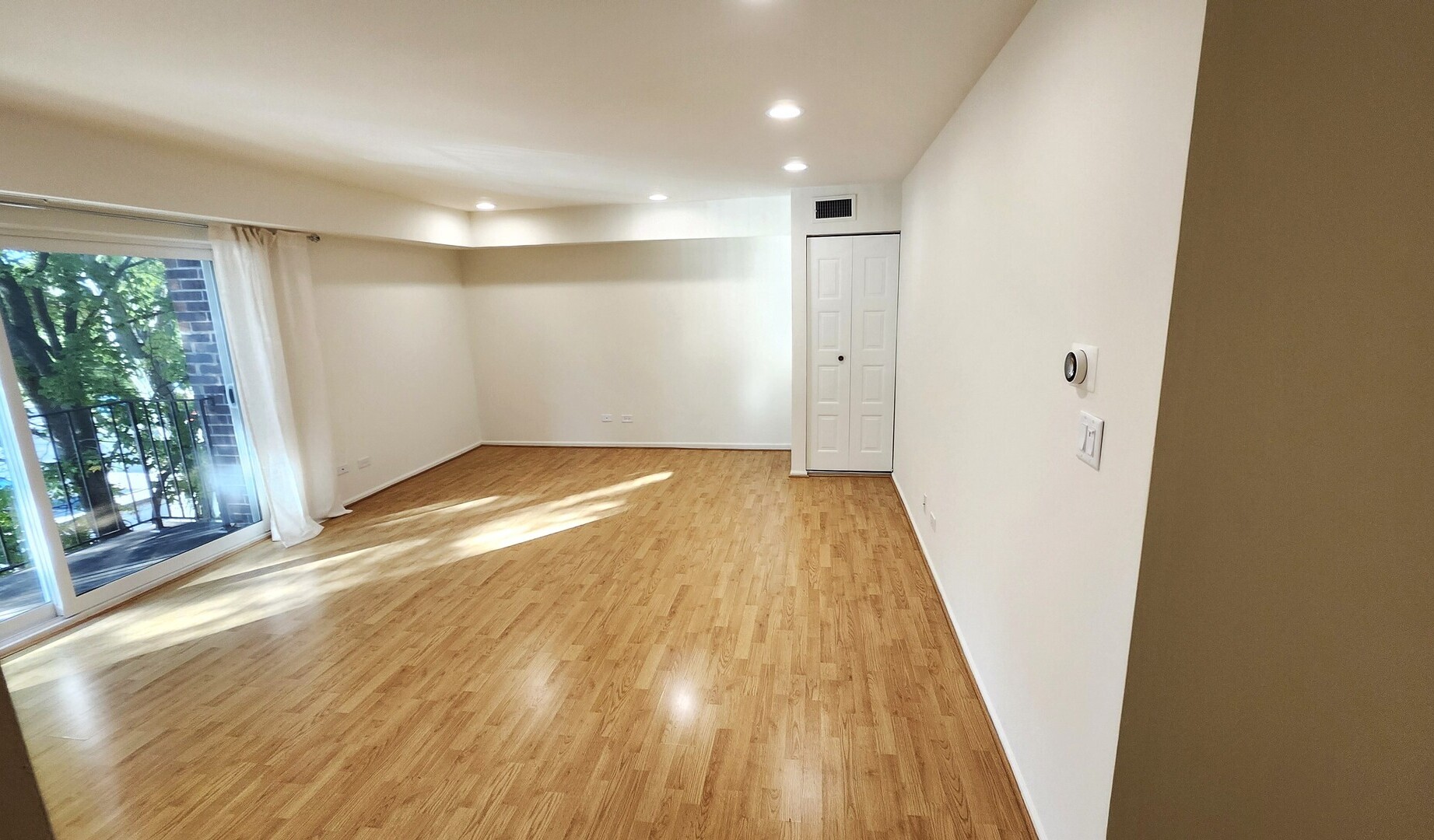 1450 Sandpebble Drive, Unit 333 Wheeling, IL 60090 - Photo 5 of 22 a view of a room with wooden floor and natural light