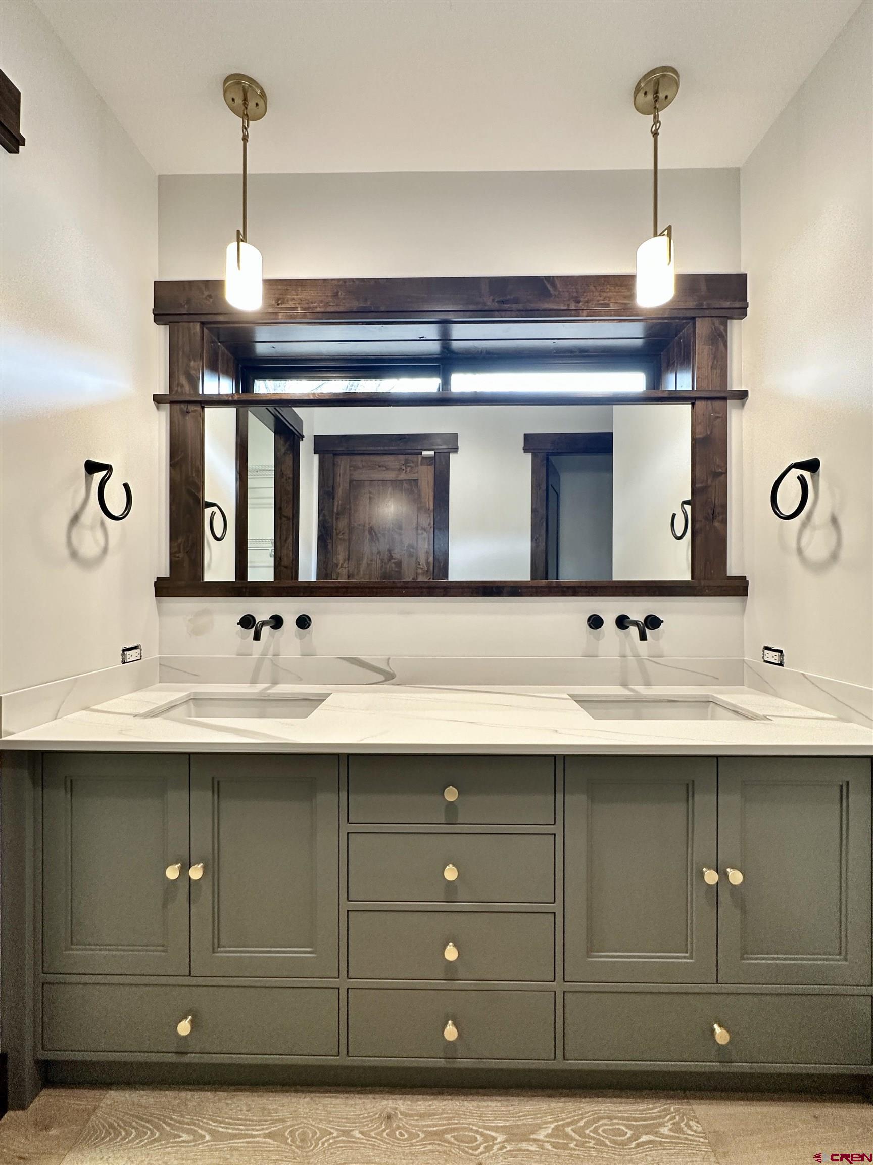 820 Southeast Pine Street Cedaredge, CO 81413 - Photo 21 of 35 a bathroom with a sink and a mirror