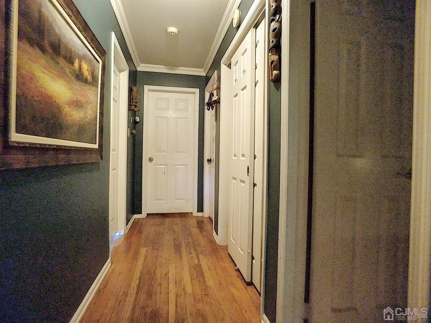 26 Fairfield Road Princeton, NJ 08540 - Photo 14 of 26 a view of a hallway with wooden floor and door