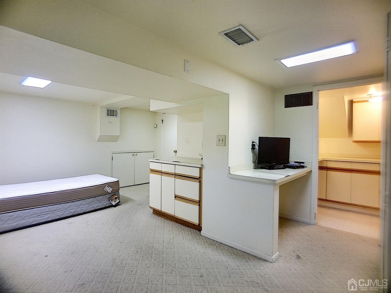 26 Fairfield Road Princeton, NJ 08540 - Photo 10 of 26 a room with a bed and a television