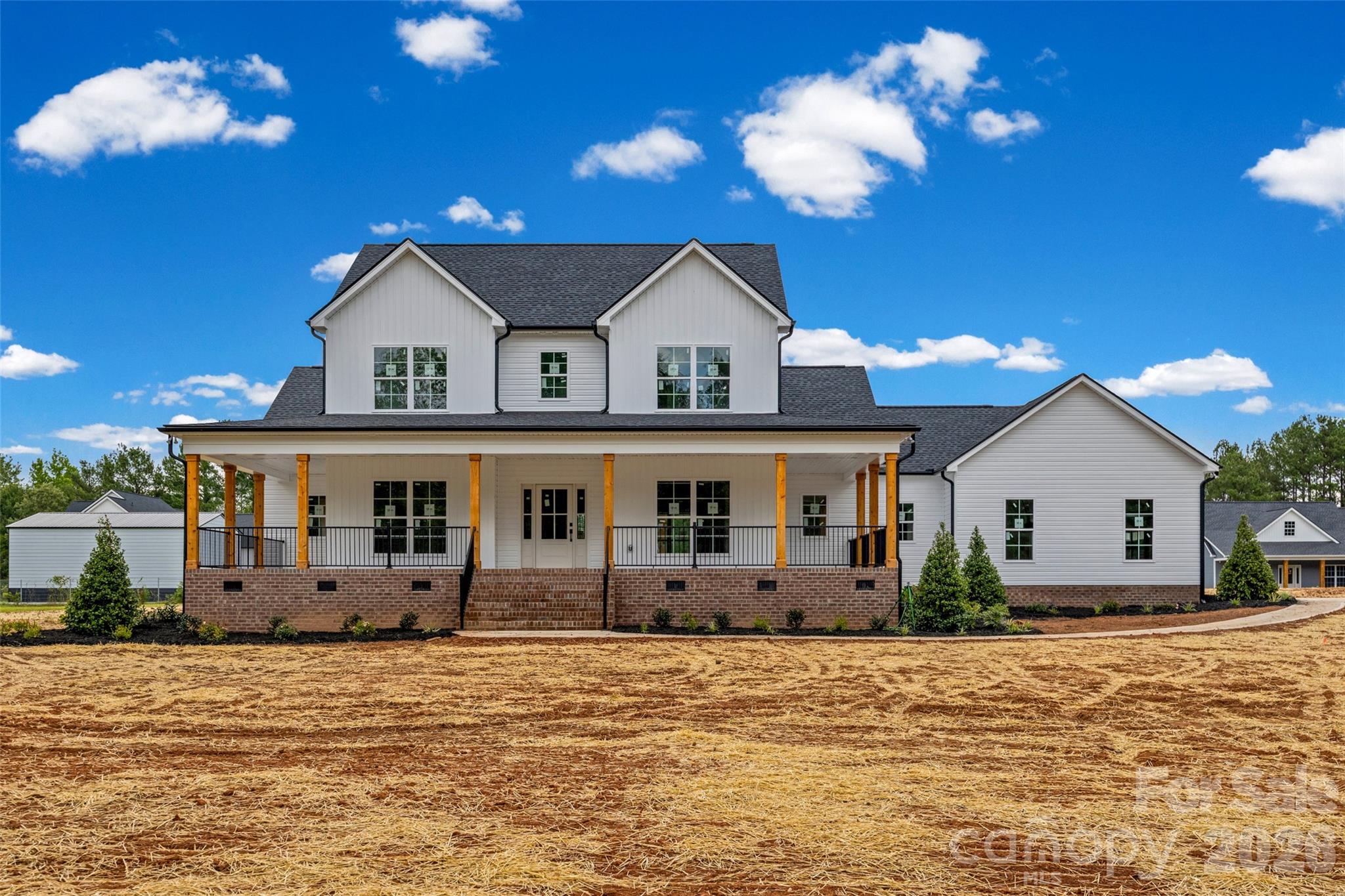 640 Edwards Road Fort Lawn, SC 29714 - Photo 2 of 39 a front view of house with yard and trees in the background