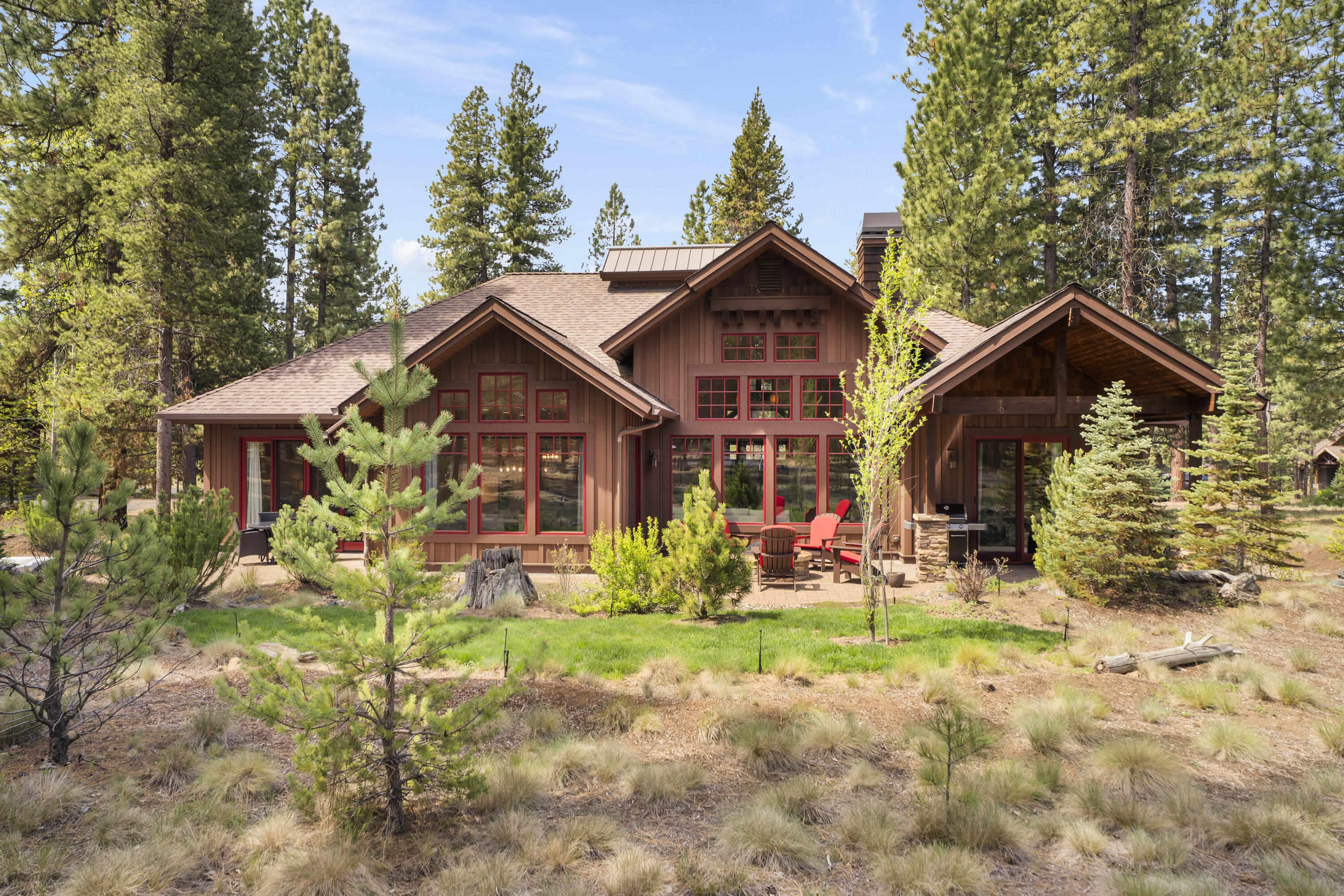 56155 Sable Rock Loop, Unit 277 Bend, OR 97707 - Photo 5 of 63 Backing to serene open space, this exceptional home blends indoor and outdoor living with privacy, sunshine, and picturesque forest surroundings.