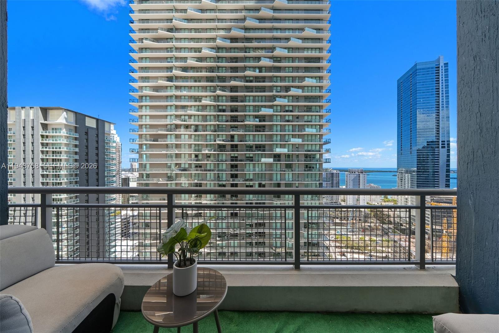 60 Southwest 13th Street, Unit 2812 Miami, FL 33130 - Photo 19 of 66 a view of a balcony with chairs
