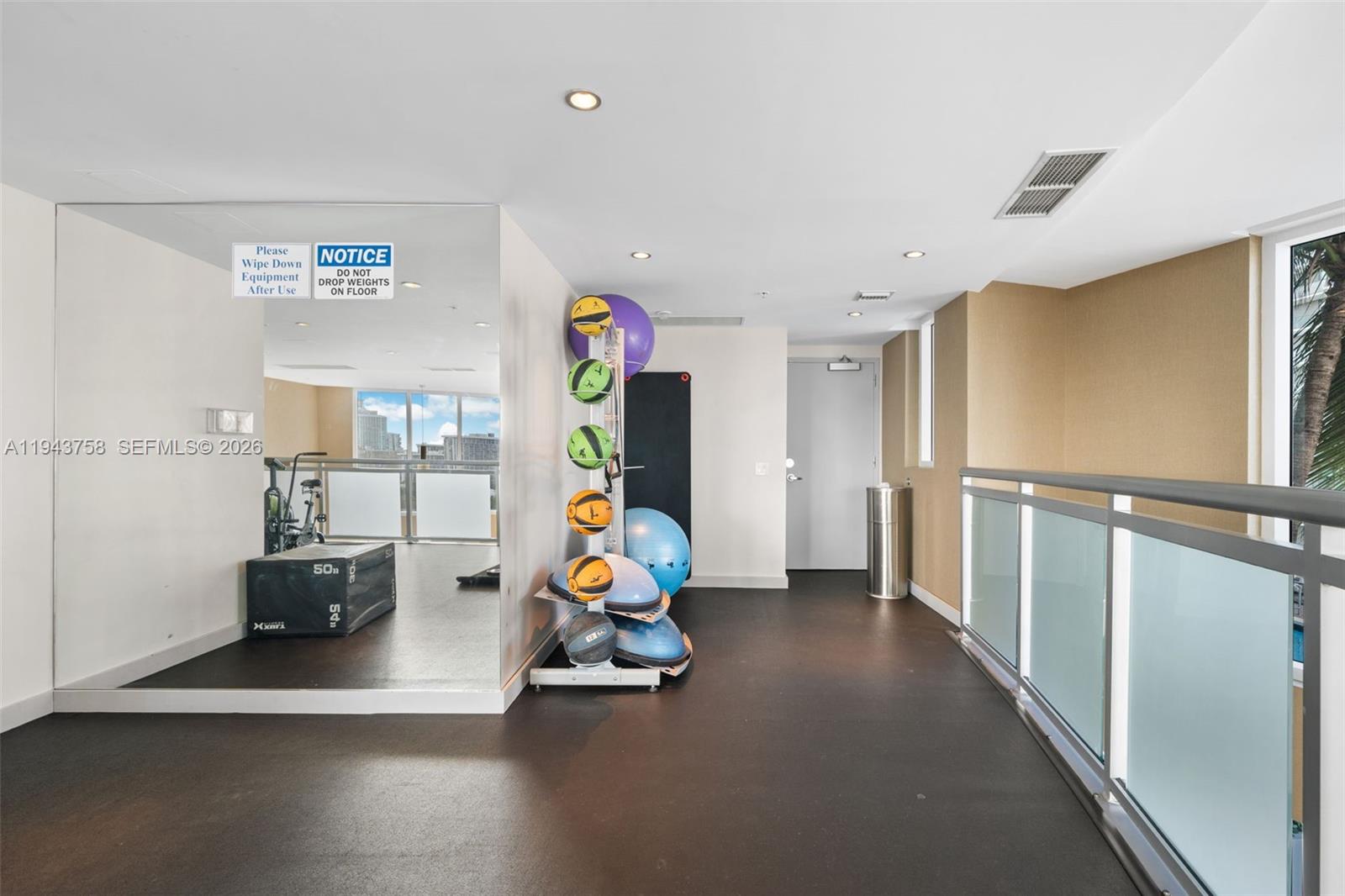 60 Southwest 13th Street, Unit 2812 Miami, FL 33130 - Photo 41 of 66 a view of a room with gym equipment