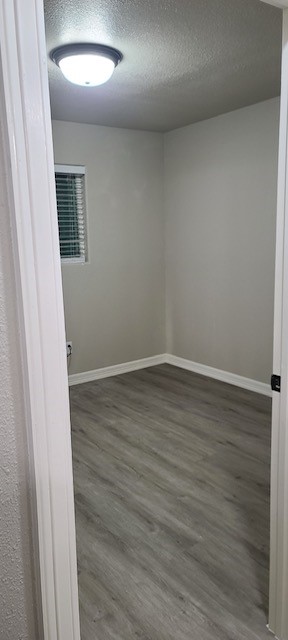 791 Fortune Street, Unit 4 Houston, TX 77088 - Photo 4 of 8 wooden floor in an empty room