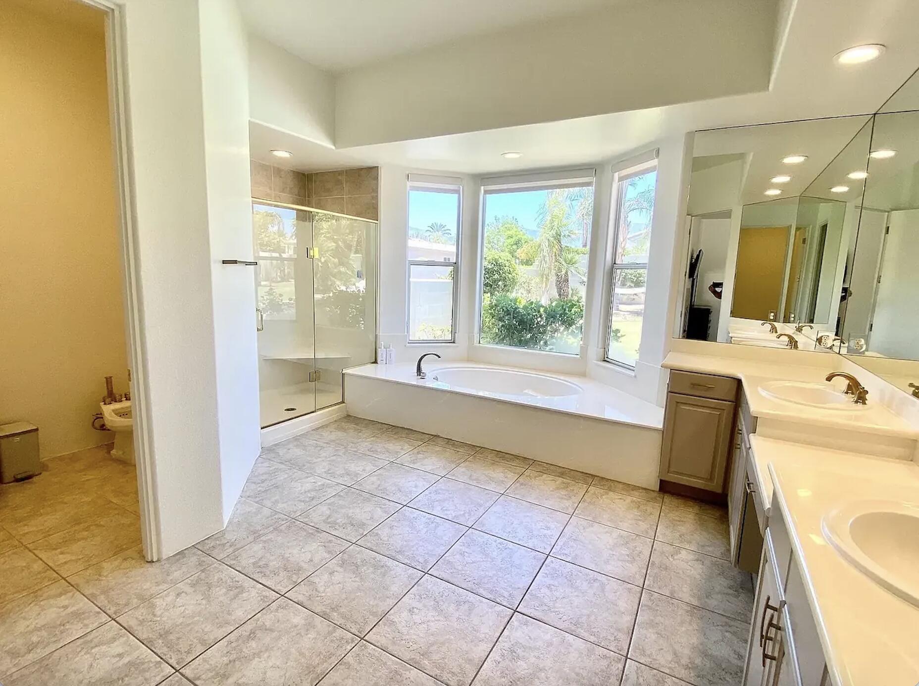 5 Victoria Falls Drive Rancho Mirage, CA 92270 - Photo 26 of 26 a bathroom with a sink a toilet and a shower