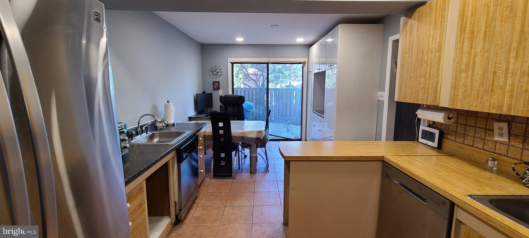 2821 Baneberry Court Baltimore, MD 21209 - Photo 17 of 31 a utility room with dryer and washer