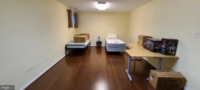 a view of workspace with wooden floor