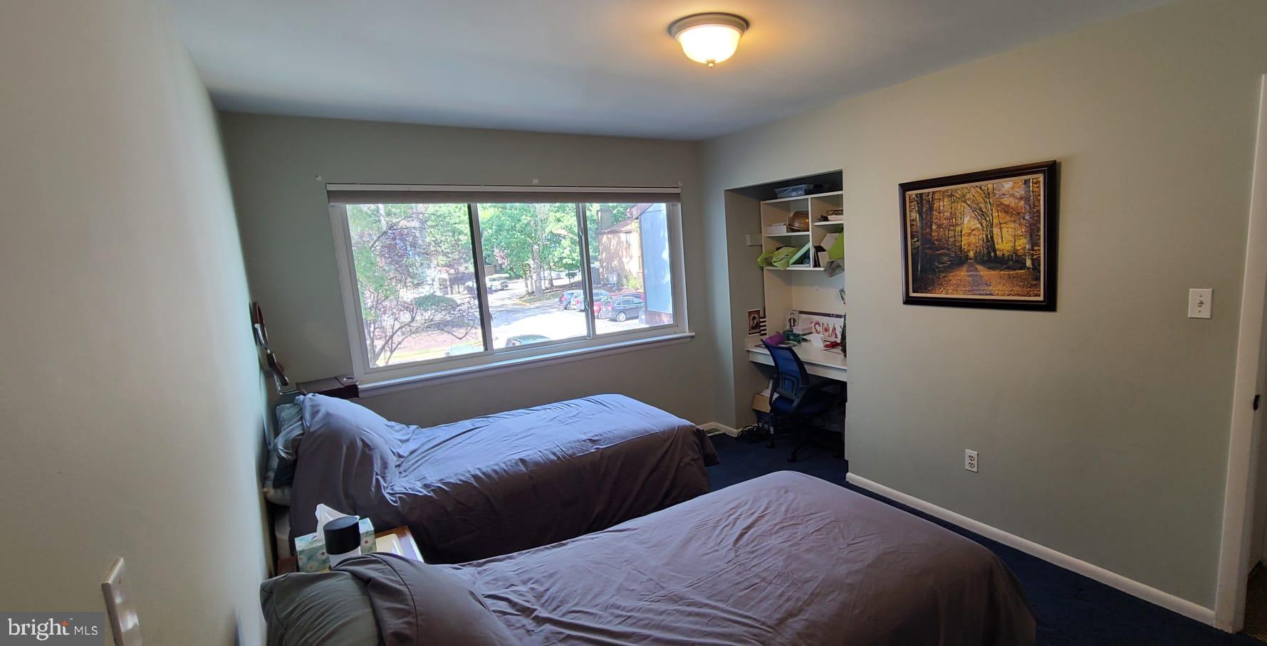 2821 Baneberry Court Baltimore, MD 21209 - Photo 7 of 31 a bedroom with a bed and wooden floor