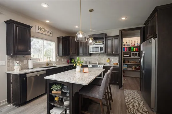 $575,000 | 104 Southwest Greenbriar Drive, Blue Springs, MO 64064