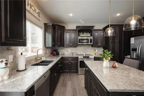 $575,000 | 104 Southwest Greenbriar Drive, Blue Springs, MO 64064