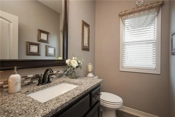 $575,000 | 104 Southwest Greenbriar Drive, Blue Springs, MO 64064