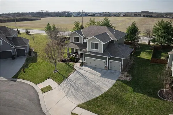 $575,000 | 104 Southwest Greenbriar Drive, Blue Springs, MO 64064