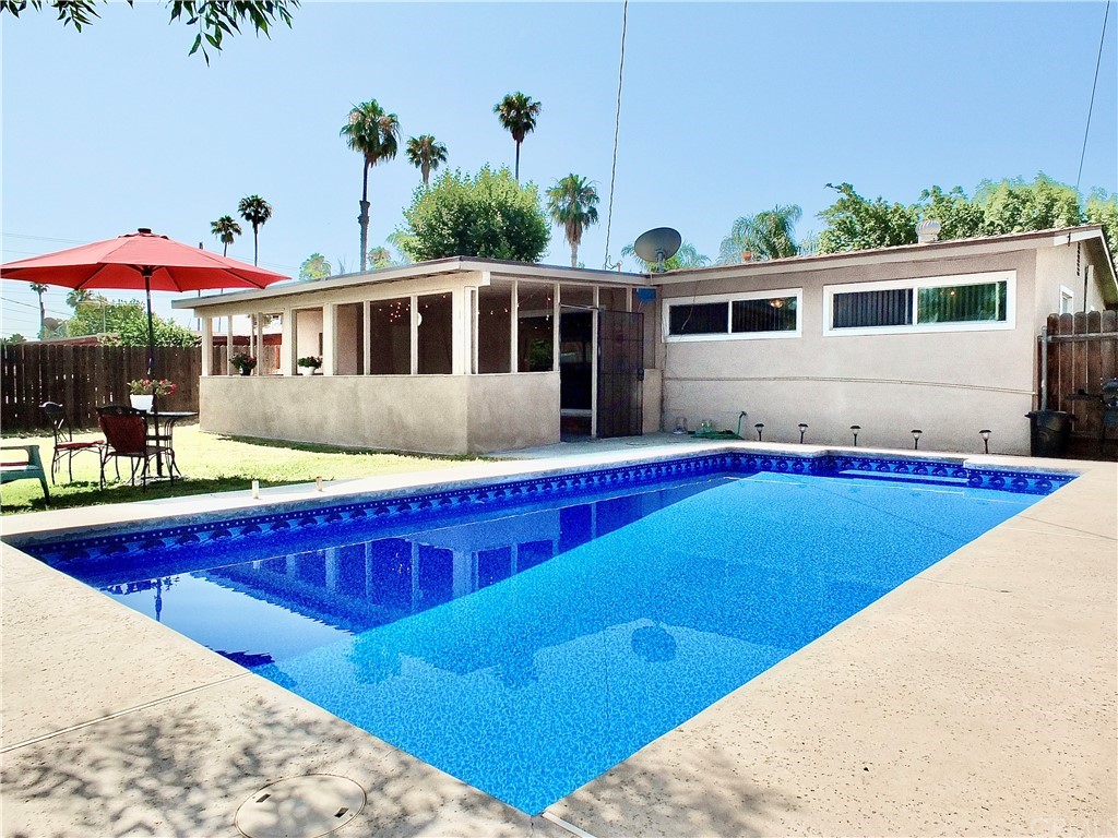 5651 Dean Way Riverside, CA 92504 - Photo 1 of 21 a view of a house with swimming pool