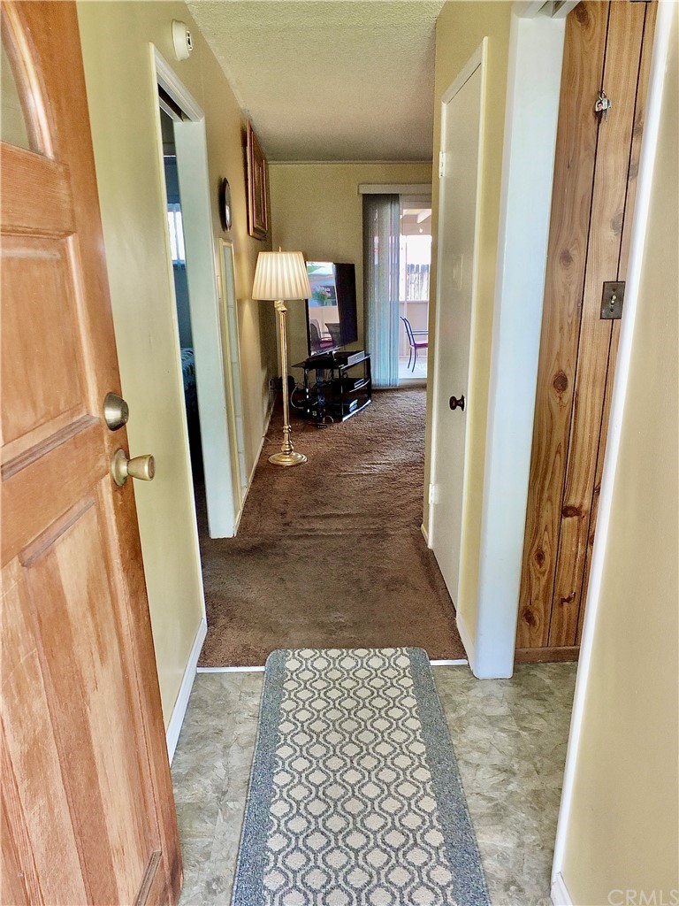 5651 Dean Way Riverside, CA 92504 - Photo 7 of 21 a view of a hallway with a furniture