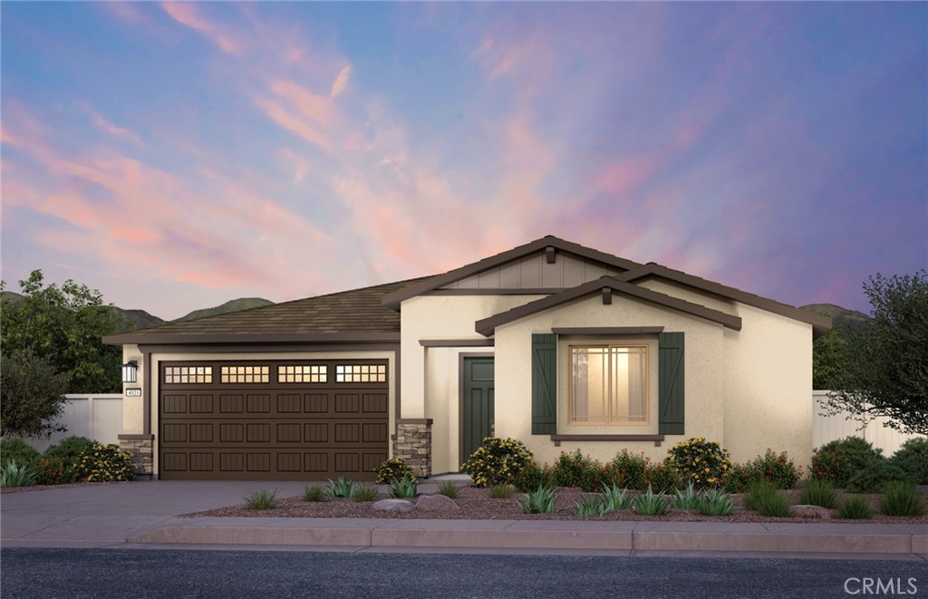 1303 Bryant Street Perris, CA 92571 - Photo 1 of 1 a front view of a house with a yard