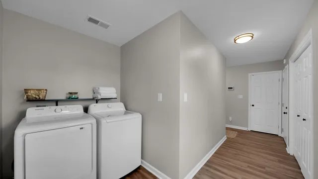 a utility room with dryer and washer