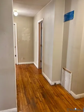 a bathroom with a toilet and shower