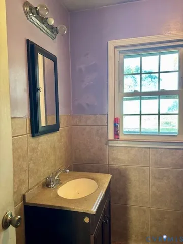 a room with furniture and chandelier